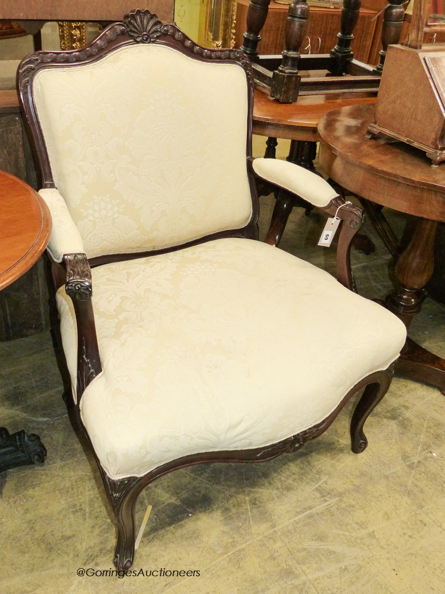 A Victorian carved mahogany armchair, width 70cm, depth 60cm, height 98cm